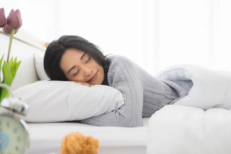 Patient asleep illustrating untreated obstructive sleep apnea symptoms managed at Dr. Yolanda Cruz's downtown Toronto practice